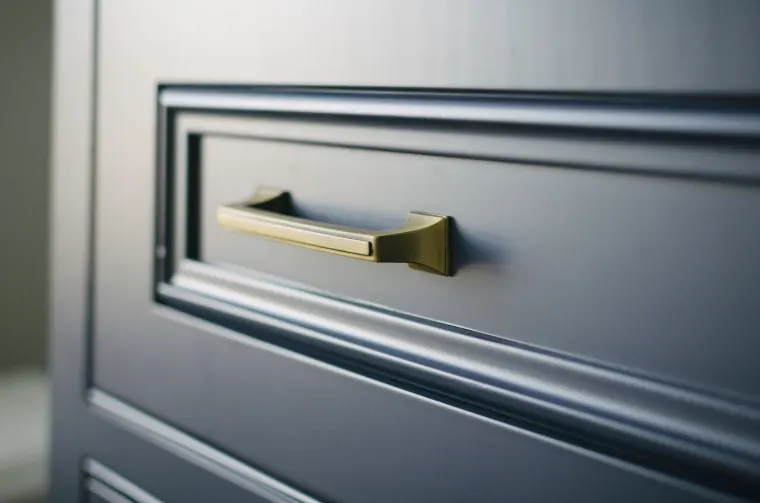 Brass cabinet hardware detail in a custom home kitchen