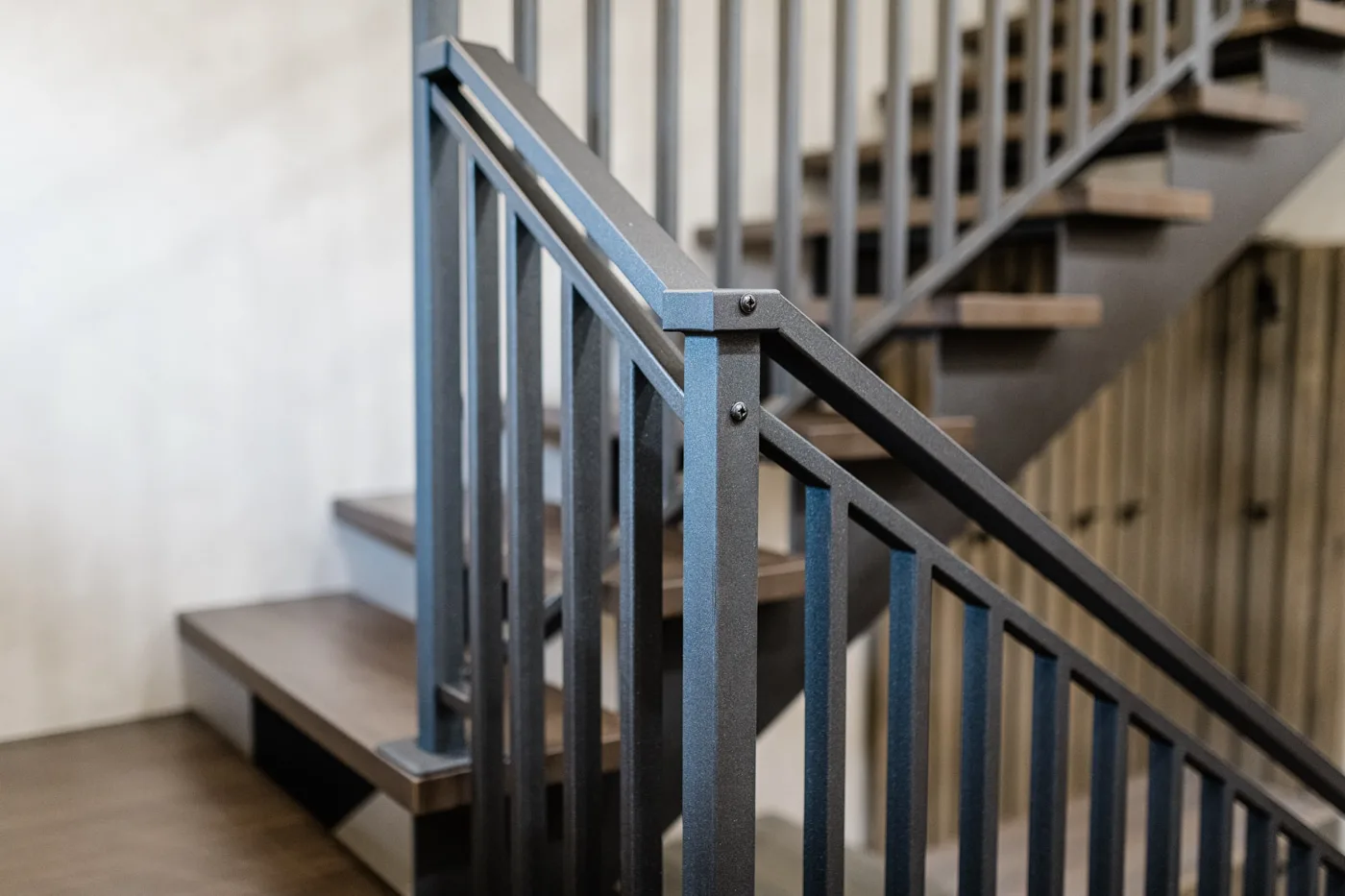 Custom stair millwork and metal railing