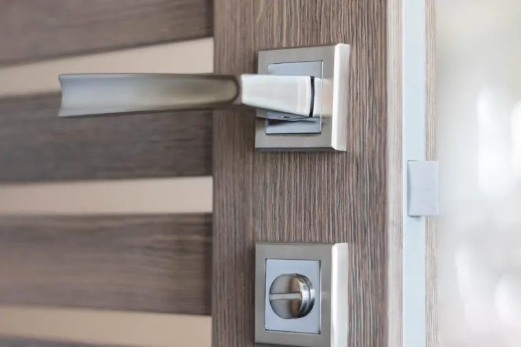Interior door hardware and trim detail in an AXIS custom home