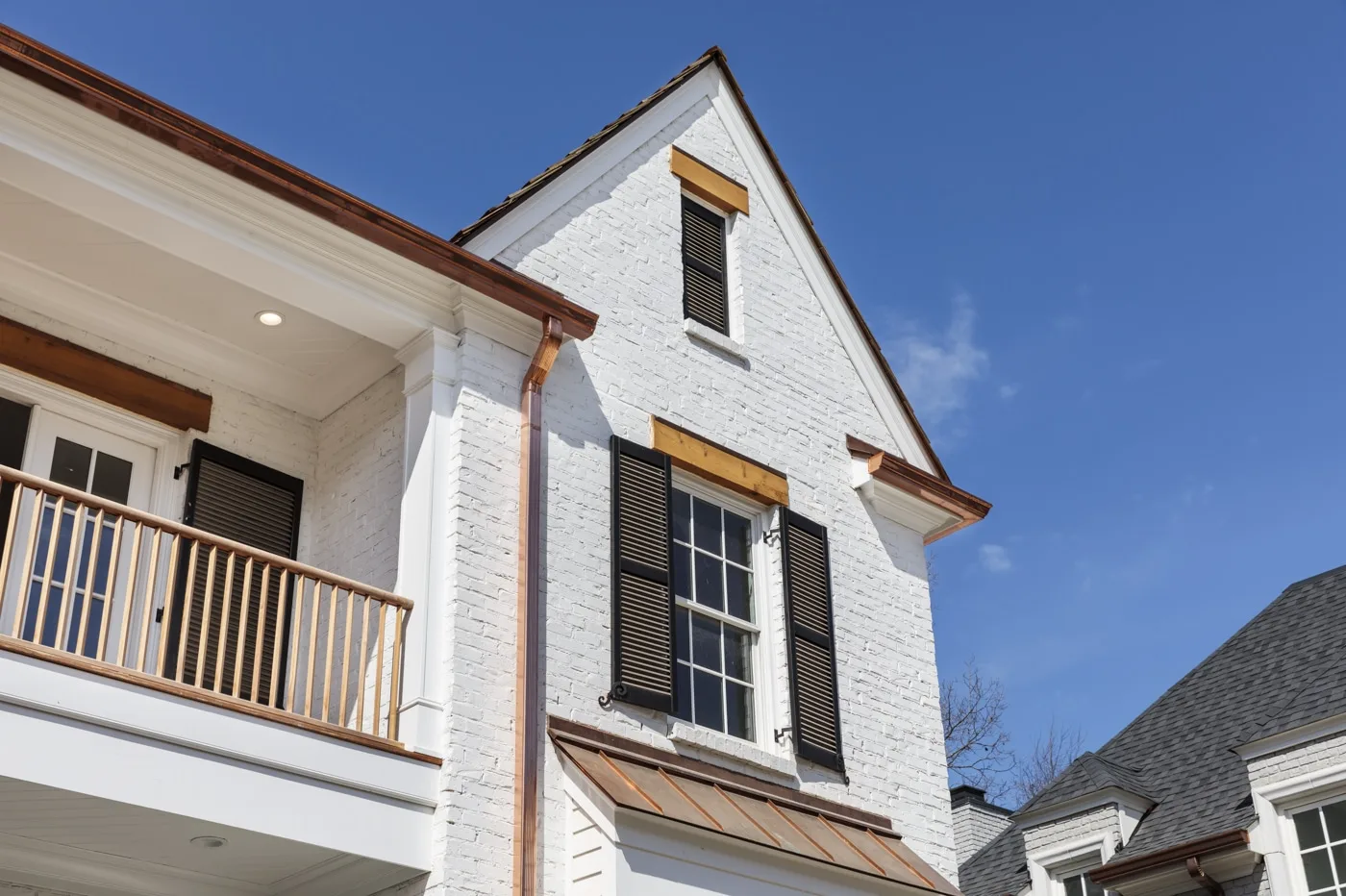 White brick custom home with copper detailing near Washington, Indiana